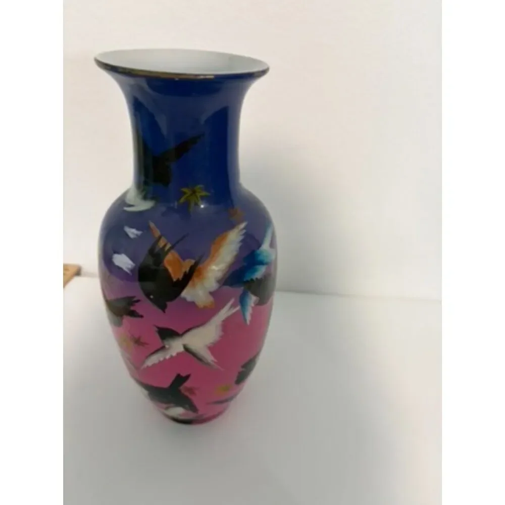 japanese vase with dark blue and pink ground, featuring birds